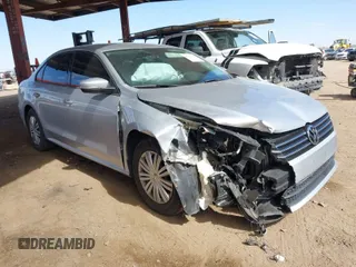2015 Volkswagen Passat 1.8T Wolfsburg Ed with VIN 1VWAT7A31FC028990, listed as a IAAI auction lot 41778229 with 73,553 mi miles. Bid and sale history available at carsss.com. Image 1.