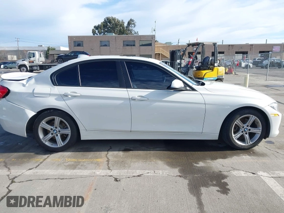 2015 BMW 3 Series 328i with VIN WBA3C1C52FK119339, listed as a IAAI auction lot 41549876 with 148,347 mi miles and . Bid and sale history available at carsss.com. Image 13.