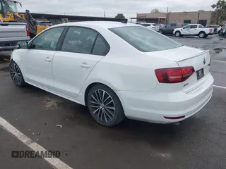 2016 Volkswagen Jetta Sedan 1.8T Sport with VIN 3VWD17AJ3GM404199, listed as a IAAI auction lot 41934993 with 43,183 mi miles. Bid and sale history available at carsss.com. Image 3.