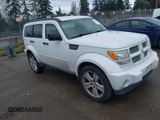 2011 Dodge Nitro Heat with VIN 1D4PU4GK9BW598044, listed as a IAAI auction lot 41863209 with 126,335 mi miles. Bid and sale history available at carsss.com. Image 1.