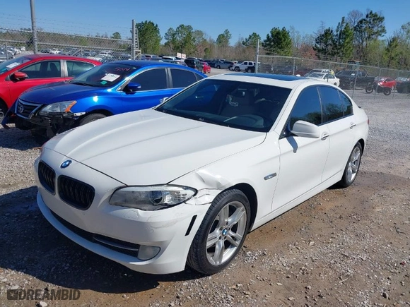 2012 BMW 5 Series 528i with VIN WBAXG5C54CDY28805, listed as a IAAI auction lot 41777043 with 128,056 mi miles. Bid and sale history available at carsss.com. Image 2.