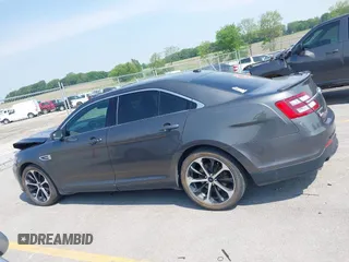2015 Ford Taurus SEL with VIN 1FAHP2H81FG123199, listed as a IAAI auction lot 42431645 with 183,456 mi miles and . Bid and sale history available at DreamBid. Image 14.