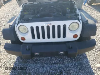 2010 Jeep Wrangler Rubicon with VIN 1J4BA6D17AL132002, listed as a Copart auction lot 83869124 with 183,507 mi miles and Salvage title. Bid and sale history available at DreamBid. Image 11.