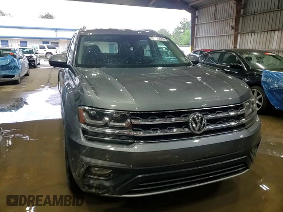 2018 Volkswagen Atlas SE with VIN 1V2CP2CA9JC599827, listed as a Copart auction lot 55695875 with 64,268 mi miles and Salvage title. Bid and sale history available at DreamBid. Image 14.
