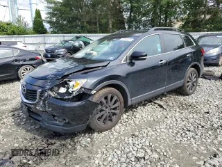 2015 Mazda CX-9 Grand Touring with VIN JM3TB3DV7F0459704, listed as a Copart auction lot 61352235 with 156,646 mi miles and Salvage title. Bid and sale history available at DreamBid. Image 1.