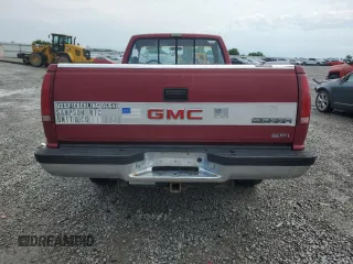 1990 GMC Sierra 1500 z VIN 1GTFC24K8LE514419, wystawiony jako Copart lot #57265335 z przebiegiem 162 045 mil mil oraz Szkoda całkowita • Salvage title. Historia ofert i sprzedaży dostępna na DreamBid. Obrazek 6.