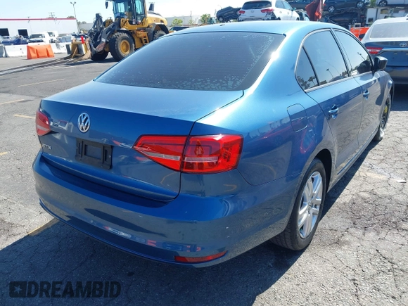 2015 Volkswagen Jetta S with VIN 3VW2K7AJ7FM249112, listed as a IAAI auction lot 42661446 with 124,541 mi miles and . Bid and sale history available at DreamBid. Image 4.