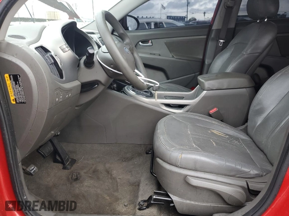 2012 Kia Sportage LX with VIN KNDPB3A22C7306283, listed as a Copart auction lot 43462124 with 166,886 mi miles and Salvage Title. Bid and sale history available at carsss.com. Image 7.