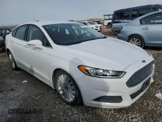 2014 Ford Fusion SE Hybrid with VIN 3FA6P0LUXER379123, listed as a Copart auction lot 45771445 with 180,393 mi miles and Salvage title. Bid and sale history available at DreamBid. Image 4.