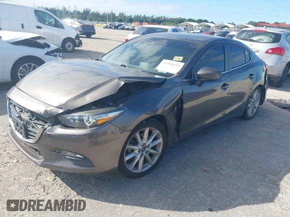 2017 Mazda 3 Touring with VIN 3MZBN1V76HM112250, listed as a IAAI auction lot 40900193 with 131,110 mi miles and . Bid and sale history available at DreamBid. Image 2.