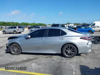 2023 Toyota Camry SE z VIN 4T1G11AK9PU805365, wystawiony jako IAAI lot #40647197 z przebiegiem 18 643 mil mil oraz . Historia ofert i sprzedaży dostępna na DreamBid. Obrazek 15.