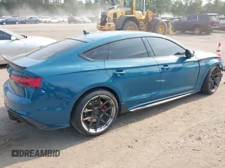 2023 Audi S5 Sportback Premium Plus z VIN WAUC4CF50PA004945, wystawiony jako IAAI lot #42476245 z przebiegiem 46 079 mil mil oraz . Historia ofert i sprzedaży dostępna na DreamBid. Obrazek 4.