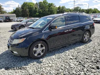 2011 Honda Odyssey Touring с VIN 5FNRL5H95BB011577, выставлен на аукционе Copart как лот 58445085 с пробегом 150 797 миль миль и Чистый • Clean title. История ставок и продаж доступна на DreamBid. Изображение 1.