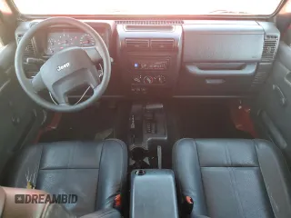 2004 Jeep Wrangler Sport with VIN 1J4FA49S24P720488, listed as a Copart auction lot 60331795 with 134,974 mi miles and Salvage title. Bid and sale history available at DreamBid. Image 8.