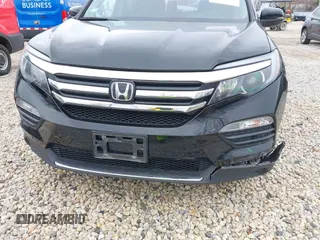 2017 Honda Pilot Touring with VIN 5FNYF6H90HB051700, listed as a IAAI auction lot 41902075 with 69,712 mi miles. Bid and sale history available at carsss.com. Image 20.