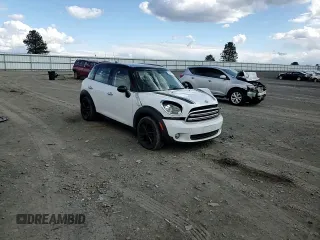 2015 MINI Countryman with VIN WMWZB3C50FWR44801, listed as a Copart auction lot 51957715 with 69,537 mi miles and Salvage Title. Bid and sale history available at DreamBid. Image 10.