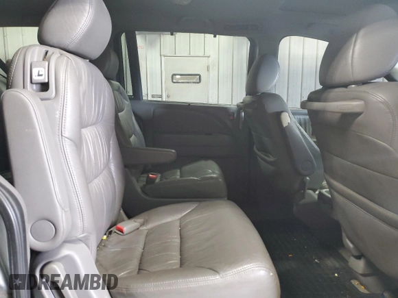 2008 Honda Odyssey EX-L z VIN 5FNRL38768B025497, wystawiony jako Copart lot #57636525 z przebiegiem 179 568 mil mil oraz Nie do naprawy • Non repairable. Historia ofert i sprzedaży dostępna na DreamBid. Obrazek 11.