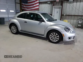 2014 Volkswagen Beetle Entry z VIN 3VWF17AT8EM645912, wystawiony jako Copart lot #49214225 z przebiegiem 152 204 mil mil oraz Czysty tytuł • Clean title. Historia ofert i sprzedaży dostępna na DreamBid. Obrazek 4.