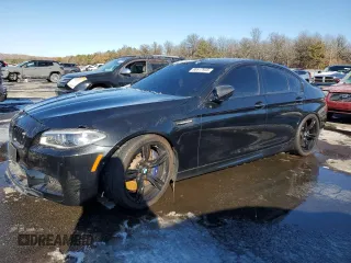 2015 BMW M5 with VIN WBSFV9C58FD594659, listed as a Copart auction lot 88617935 with 58,067 mi miles and Salvage Title. Bid and sale history available at carsss.com. Image 1.