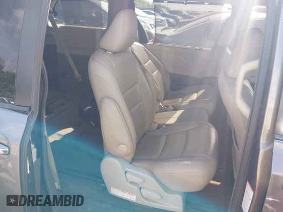 2015 Toyota Sienna XLE with VIN 5TDYK3DC6FS542504, listed as a IAAI auction lot 42569992 with 113,004 mi miles and . Bid and sale history available at DreamBid. Image 8.
