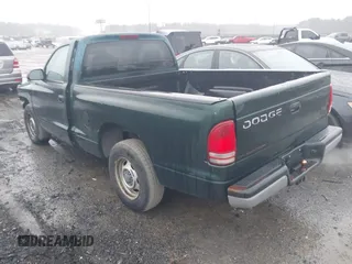 1999 Dodge Dakota SLT with VIN 1B7FL26XXXS209424, listed as a IAAI auction lot 41264544 with 70,523 mi miles. Bid and sale history available at carsss.com. Image 3.