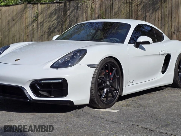2016 Porsche Cayman S with VIN WP0AB2A88GK185895, listed as a Copart auction lot 54412305 with 27,100 mi miles and Salvage Title. Bid and sale history available at DreamBid. Image 2.