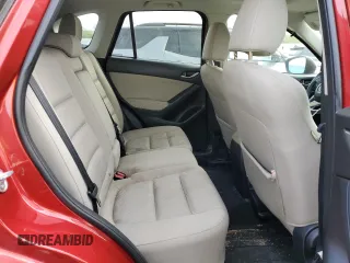 2014 Mazda CX-5 Touring with VIN JM3KE2CY6E0316041, listed as a Copart auction lot 52227835 with 69,921 mi miles and Salvage Title. Bid and sale history available at DreamBid. Image 11.