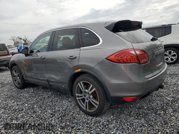 2011 Porsche Cayenne S with VIN WP1AB2A2XBLA55565, listed as a Copart auction lot 63094305 with 105,250 mi miles and Salvage title. Bid and sale history available at DreamBid. Image 2.