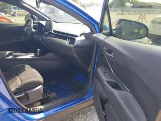 2019 Toyota C-HR XLE with VIN JTNKHMBX7K1015798, listed as a IAAI auction lot 39530918 with 77,958 mi miles. Bid and sale history available at carsss.com. Image 5.