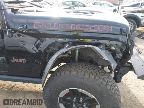 2020 Jeep Wrangler Unlimited Rubicon with VIN 1C4HJXFG1LW141335, listed as a IAAI auction lot 42724973 with 59,843 mi miles and . Bid and sale history available at DreamBid. Image 17.