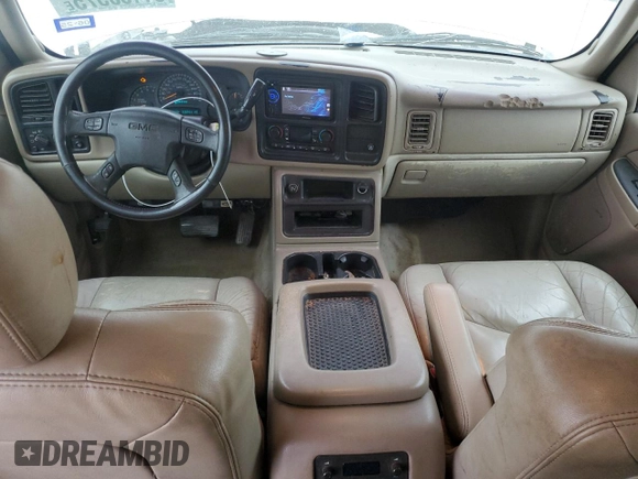 2004 GMC Yukon SLT with VIN 1GKEC13Z34R313210, listed as a Copart auction lot 51150575 with 328,961 mi miles and Salvage Title. Bid and sale history available at carsss.com. Image 8.