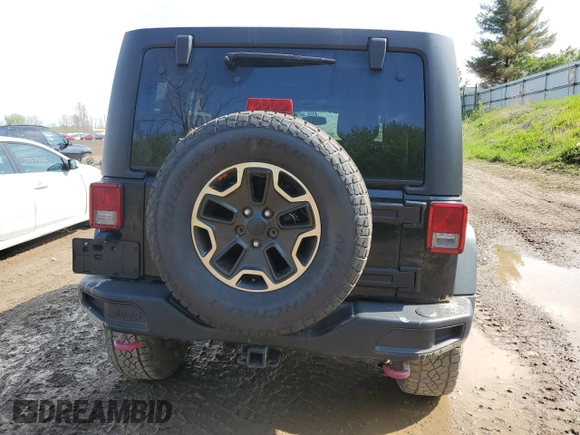 2015 Jeep Wrangler Unlimited Rubicon Hard Rock z VIN 1C4HJWFG5FL706170, wystawiony jako Copart lot #55442965 z przebiegiem Nie podano mil oraz Czysty tytuł • Clean title. Historia ofert i sprzedaży dostępna na DreamBid. Obrazek 6.