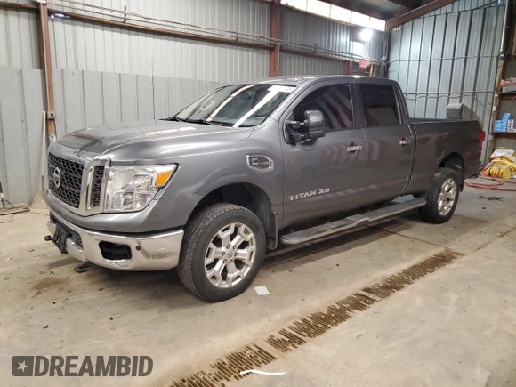 2016 Nissan Titan Platinum Reserve z VIN 1N6BA1F27GN517455, wystawiony jako Copart lot #51257125 z przebiegiem 156 675 mil mil oraz Czysty tytuł • Clean title. Historia ofert i sprzedaży dostępna na DreamBid. Obrazek 1.