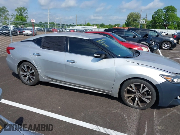 2017 Nissan Maxima SR with VIN 1N4AA6APXHC426651, listed as a IAAI auction lot 42242002 with 155,824 mi miles and . Bid and sale history available at DreamBid. Image 13.