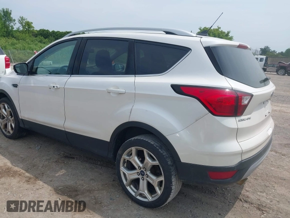 2019 Ford Escape Titanium with VIN 1FMCU9J90KUA86338, listed as a IAAI auction lot 42690159 with 115,891 mi miles and . Bid and sale history available at DreamBid. Image 3.