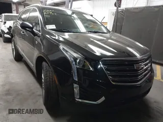 2019 Cadillac XT5 Luxury FWD z VIN 1GYKNCRS5KZ142904, wystawiony jako IAAI lot #41896551 z przebiegiem 130 667 mil mil oraz . Historia ofert i sprzedaży dostępna na DreamBid. Obrazek 1.