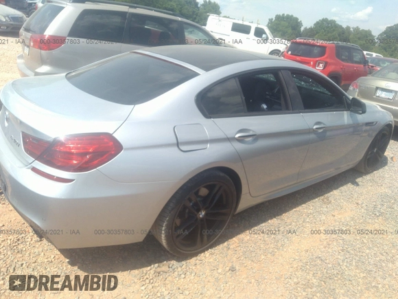 2015 BMW 6 Series 640i z VIN WBA6A0C57FGB53750, wystawiony jako IAAI lot #30357803 z przebiegiem 59 462 mil mil oraz . Historia ofert i sprzedaży dostępna na DreamBid. Obrazek 4.