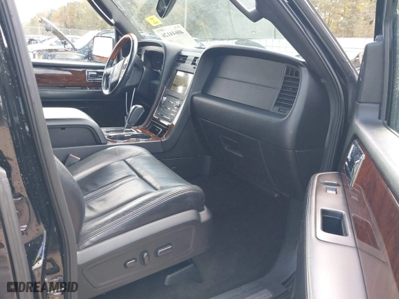 2016 Lincoln Navigator Select with VIN 5LMJJ2HT3GEL00651, listed as a IAAI auction lot 40644126 with 127,821 mi miles. Bid and sale history available at carsss.com. Image 5.