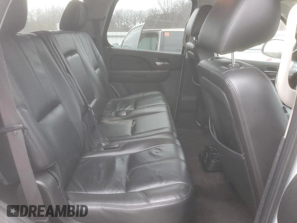 2012 GMC Yukon SLT with VIN 1GKS2CE09CR122728, listed as a Copart auction lot 87093604 with 124,739 mi miles and Salvage Title. Bid and sale history available at carsss.com. Image 12.