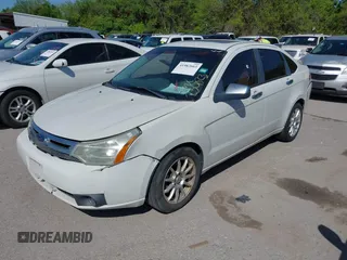 2010 Ford Focus SEL with VIN 1FAHP3HN2AW230823, listed as a IAAI auction lot 41982663 with 138,427 mi miles. Bid and sale history available at carsss.com. Image 2.