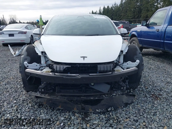2023 Tesla Model 3 with VIN 5YJ3E1EA2PF612427, listed as a IAAI auction lot 41793756 with 17,913 mi miles and . Bid and sale history available at carsss.com. Image 13.