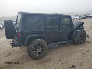 2015 Jeep Wrangler Unlimited Freedom with VIN 1C4BJWDG6FL568583, listed as a Copart auction lot 54266315 with Not provided miles and Salvage title. Bid and sale history available at DreamBid. Image 3.