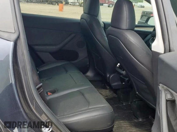 2024 Tesla Model Y Long Range with VIN 7SAYGDEE2RA287446, listed as a Copart auction lot 57640895 with 27,932 mi miles and Salvage title. Bid and sale history available at DreamBid. Image 10.