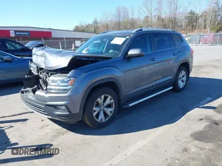 2018 Volkswagen Atlas SE with VIN 1V2CR2CA0JC571988, listed as a IAAI auction lot 41848862 with 96,426 mi miles and . Bid and sale history available at DreamBid. Image 18.