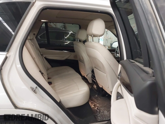 2016 BMW X5 xDrive40e with VIN 5UXKT0C50G0S77165, listed as a IAAI auction lot 40688779 with 110,317 mi miles and . Bid and sale history available at carsss.com. Image 8.