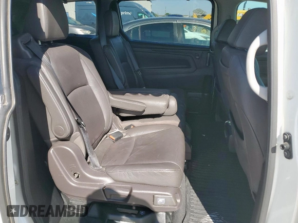 2018 Honda Odyssey Touring с VIN 5FNRL6H8XJB042111, выставлен на аукционе Copart как лот 52360005 с пробегом 126 835 миль миль и Чистый • Clean title. История ставок и продаж доступна на DreamBid. Изображение 11.
