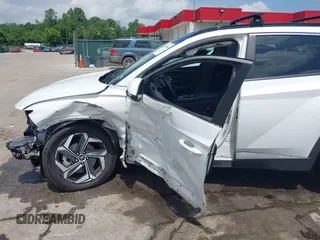 2022 Hyundai Tucson SEL Convenience with VIN KM8JFCA1XNU057877, listed as a IAAI auction lot 42256860 with 54,425 mi miles and . Bid and sale history available at DreamBid. Image 6.