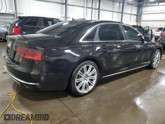 2011 Audi A8 z VIN WAURVAFD8BN005569, wystawiony jako Copart lot #52101065 z przebiegiem 104 893 mil mil oraz Szkody całkowita. Historia ofert i sprzedaży dostępna na DreamBid. Obrazek 3.