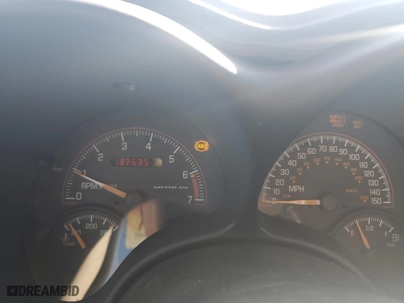 2002 Pontiac Grand Am GT with VIN 1G2NW12E22C203836, listed as a Copart auction lot 77662194 with 182,635 mi miles and Salvage Title. Bid and sale history available at carsss.com. Image 9.