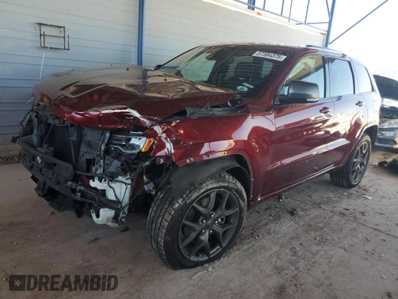 2021 Jeep Grand Cherokee 80th Anniversary with VIN 1C4RJFBG3MC631086, listed as a Copart auction lot 57304375 with 57,872 mi miles and Salvage title. Bid and sale history available at DreamBid. Image 1.